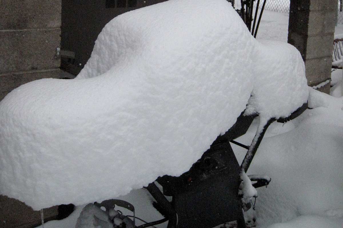 grill covered in snow