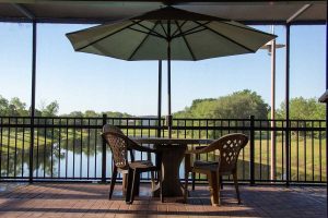 Patio umbrella overlooking lake