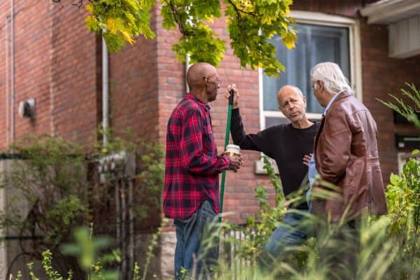 Senior neighbors talking