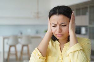 Woman impacted by noisy neighbor